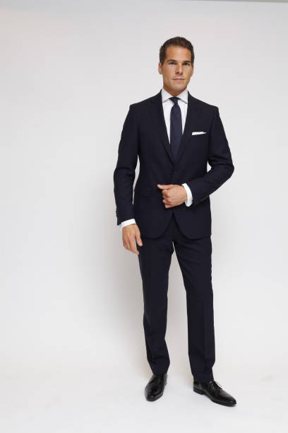 istock fashionably dressed man with suit 802418158