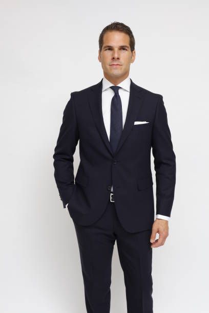 istock fashionably dressed man with suit 802418174
