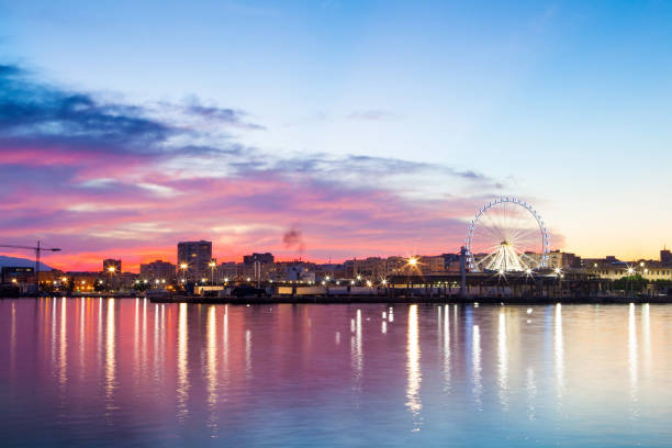 istock Stuning purple sky with clouds over Malaga city. Andalusia, Spain. 802420646