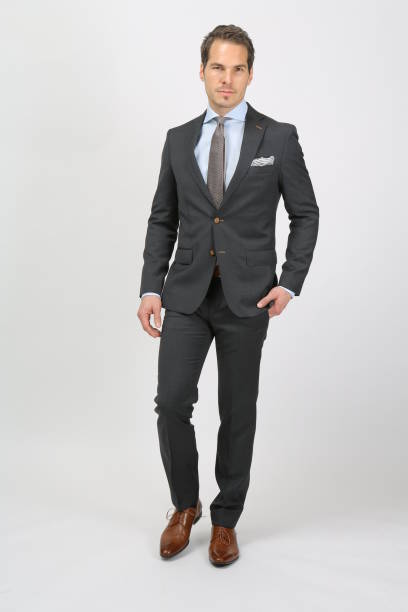 istock fashionably dressed man with suit 802420846