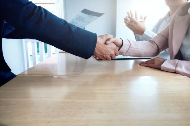 istock Business situation, job interview concept. Business people handshake. 802428532