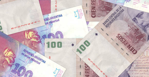 istock Argentina pesso money background 802436542