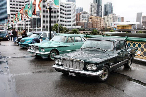 Chrysler cars owners meeting in Sydney, Australia. Chrysler Valiant in foreground, PT Cruiser in background. Charity event by Chrysler and Valiant Owners Association Ltd.
