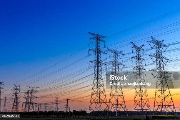 High Voltage Posthigh Voltage Tower Sky Background Stock Photo - Download Image Now