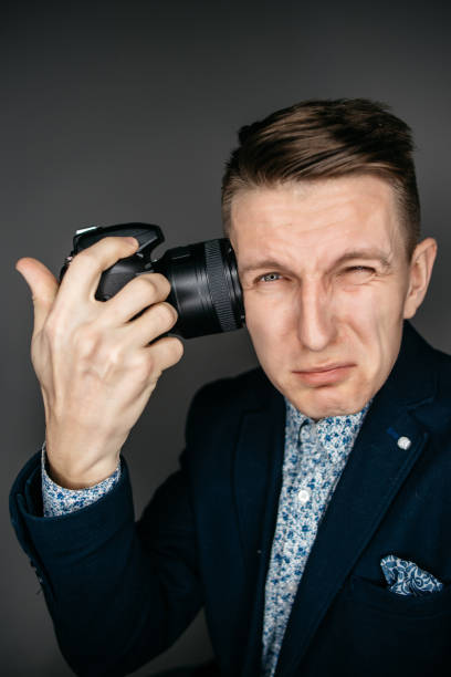 istock Portrait of male photographer 802444404