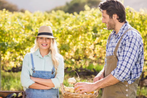 istock Happy farmer woman looking at the camera 802448934