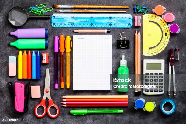 Top View Of A Large Group Of School Or Office Supplies On Black Background Stock Photo - Download Image Now