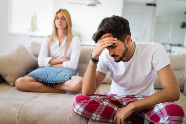 istock Unhappy couple having crisis and difficulties in relationship 802472402