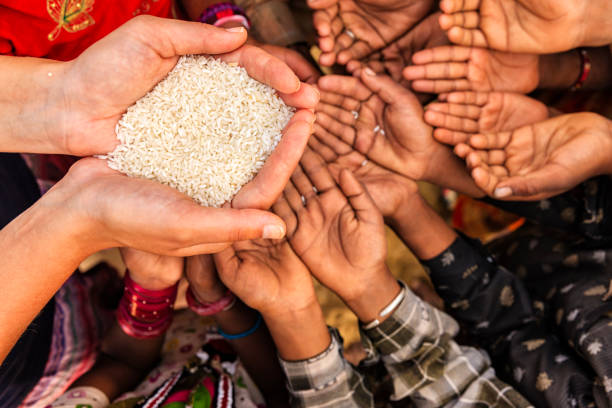 istock Poor Indian children asking for food, India 802472918