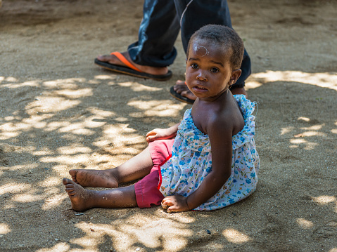 Ampasipohy, Nosy Be, Madagascar - December 19, 2015: Portrait of an unidentified Madagascar child. People in Madagascar suffer of poverty due to slow development of the country, Nosy Be Island, Madagascar.