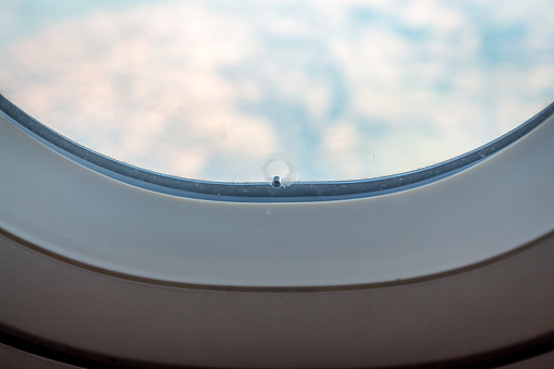 Window Bleed Airplane Window Breather Hole Bleed Hole With Wing Blue Sky Stock Photo ...