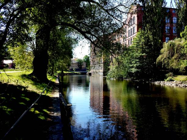 istock Urban city and river 802497980