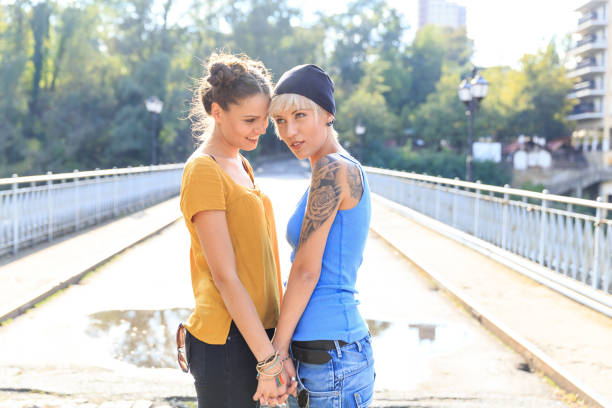 istock Two grilfriends having fun outdoors 802507924