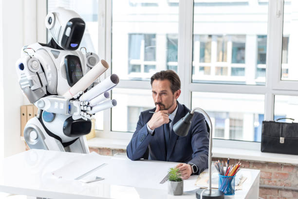 istock Pensive businessman in suit is working with robot 802508352