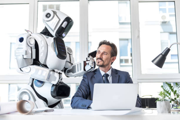 istock Pleasant businessman in suit and android are working with pleasure 802508420