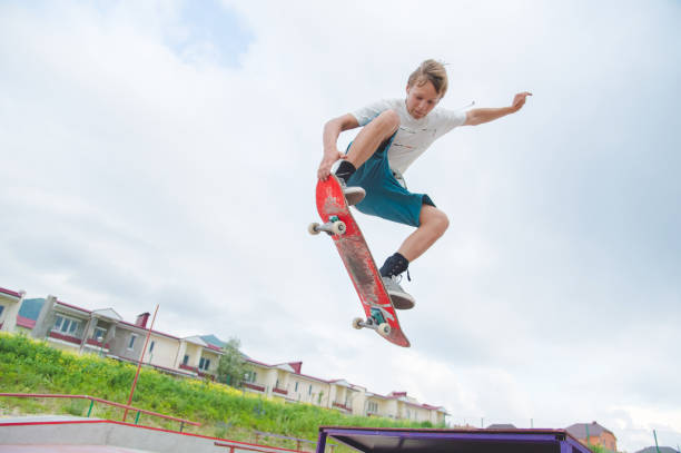 istock Young skateboarder in a jump 802526796