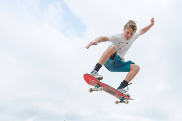 istock Young skateboarder in a jump 802528160