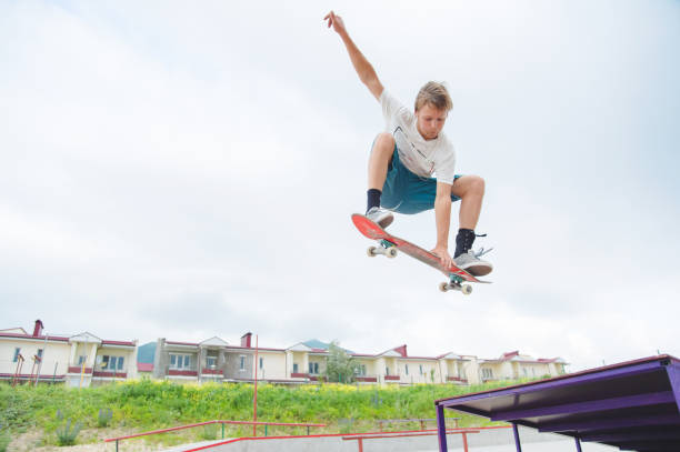istock Young skateboarder in a jump 802529952