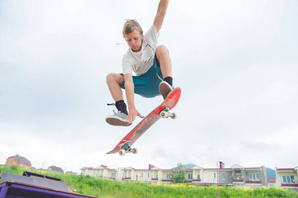 istock Young skateboarder in a jump 802531100