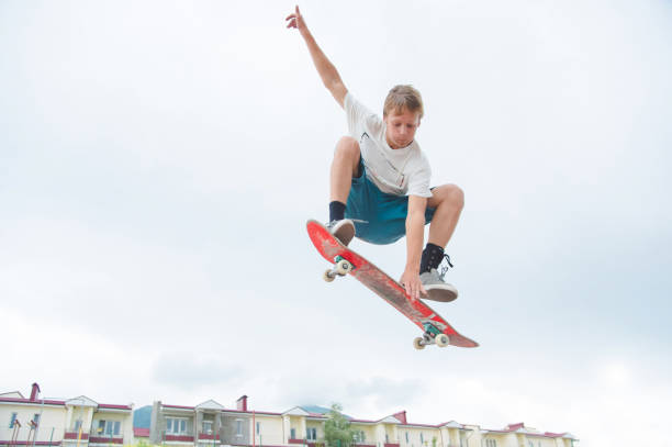istock Young skateboarder in a jump 802531156