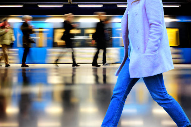 istock Woman in subway, motion blur 802540106