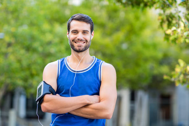 istock Portrait of an happy handsome athlete 802544498