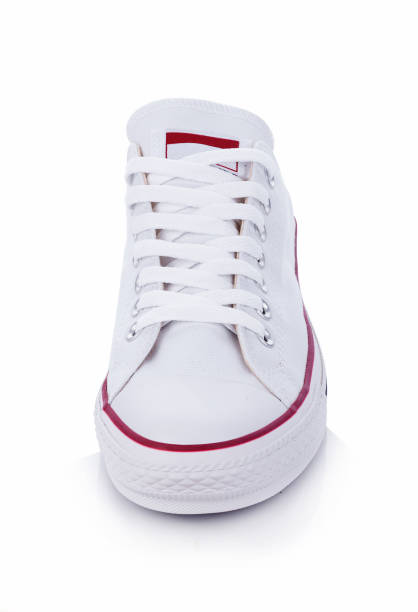 istock Classic white sneakers isolated on white background 802545288