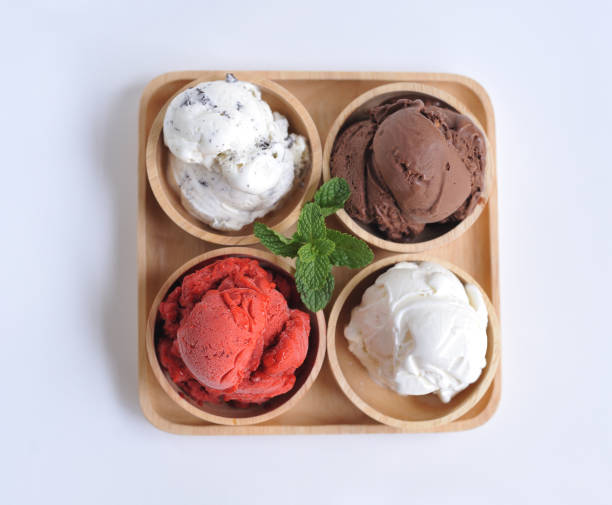 istock Homemade mixed  Ice cream scoops on wooden bowl 802546184
