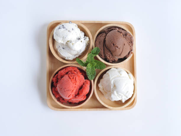 istock Homemade mixed  Ice cream scoops on wooden bowl 802546490