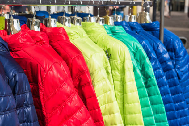 istock Winter clothes hanging at a store 802566306