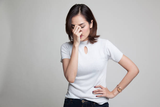 istock Young Asian woman got sick and  headache. 802566464