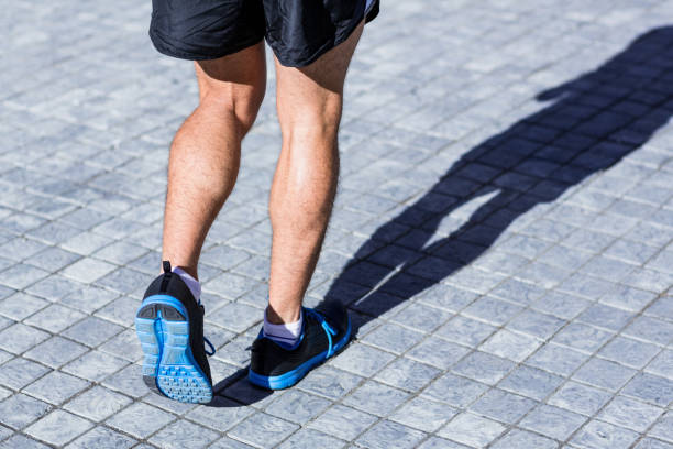 istock Legs of an athlete running 802573034