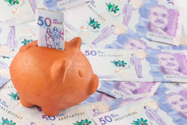 istock Saving Fifty Thousand Colombian Pesos Bills 802574104