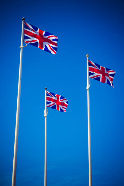 istock Trio of Union Jack Great Britain flags 802574214