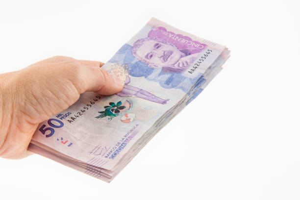 istock Woman handling money 802581420
