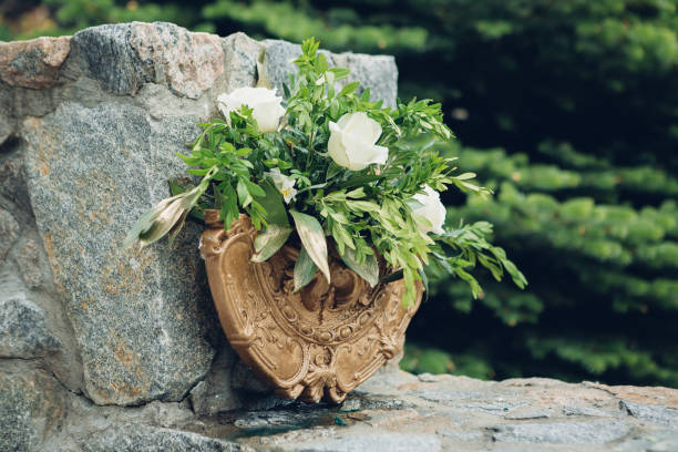istock Bouquet of white roses as decor at wedding 802589328