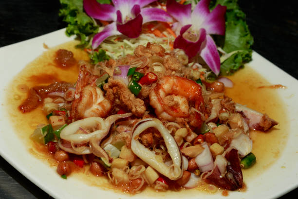 istock thailand spicy salad with herb 802589772