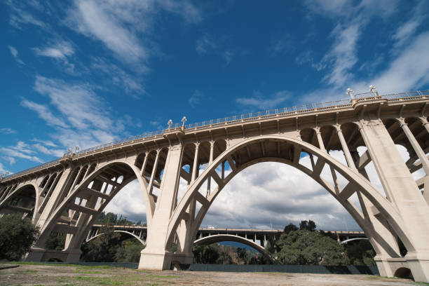 The landmark Colordado Street Bridge (also known as the Suicide Bridge) in Pasadena, California, USA. The 134 Freeway bridge over the Arroyo Seco is in the background.
