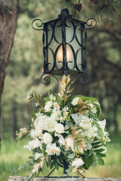 istock Bouquet of white roses as decor at wedding 802596082