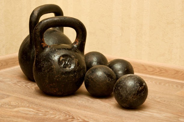 istock Dumbbells and kettlebells on the floor - 4 802597040