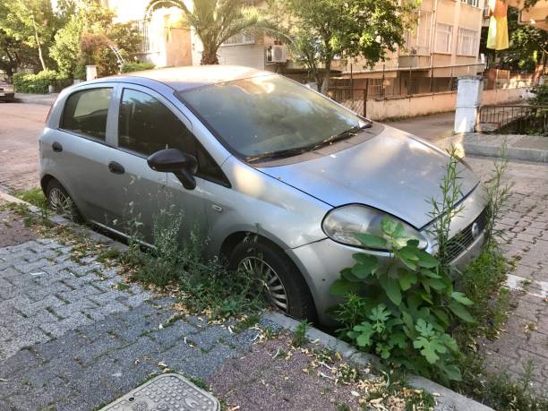 Fiat punto abandoned in the street Istanbul,Turkey-June 26,2017:Fiat punto abandoned in the street punto stock pictures, royalty-free photos & images