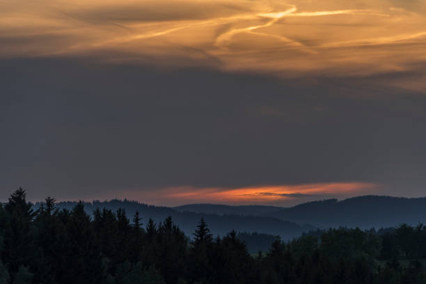 Orange sunset near Roprachtice village in spring evening
