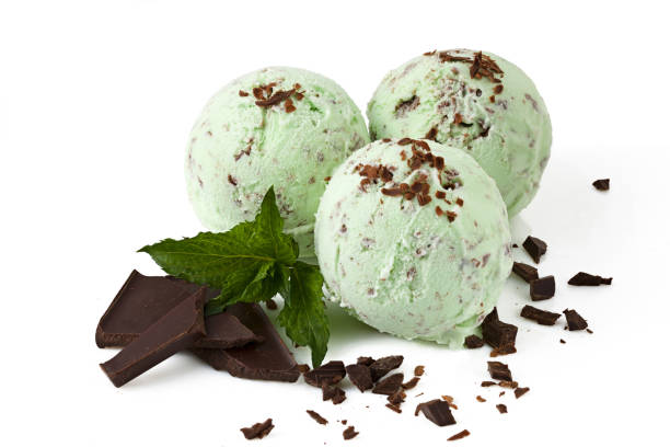 istock Three scoops of mint ice cream with chocolate crumbs isolated with clipping path 802618370