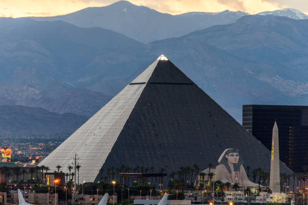 Luxor Casino Building in Las Vegas Nevada in the evening Las Vegas, USA - May 21,2017:Famous Luxor casino and hotel building in the evening in Las Vegas  Nevada USA  . Las Vegas is world famous for night entertainment show and convention center. las vegas pyramid stock pictures, royalty-free photos & images