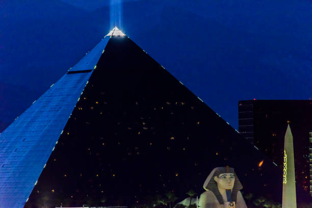 Luxor Casino Building in Las Vegas Nevada in the evening Las Vegas, USA - May 21,2017:Famous Luxor casino and hotel building in the evening in Las Vegas  Nevada USA  . Las Vegas is world famous for night entertainment show and convention center. las vegas metropolitan area luxor luxor hotel pyramid stock pictures, royalty-free photos & images