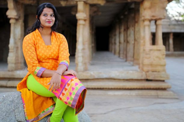istock Female Sitting in the Temple Premises 802630402