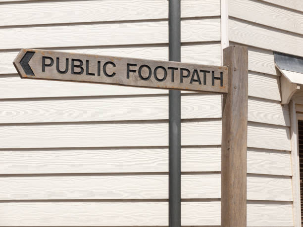 istock a wooden post outside saying public footpath showing way 802636198