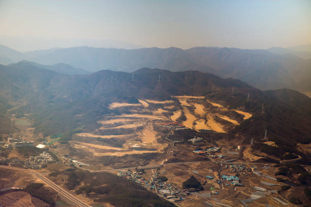 istock Abstract background of the mountain looking from the airplane - Drone (Aerial view), Sorted as layer and look amazing image, including damp, building, road and town 802638636