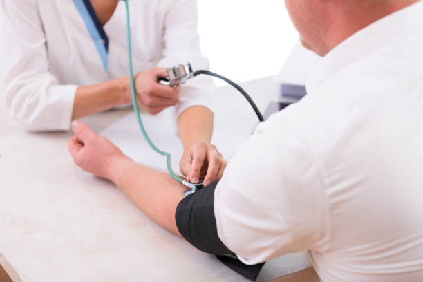 istock A female doctor showing on a notepad diagnosis to a patient 802641016