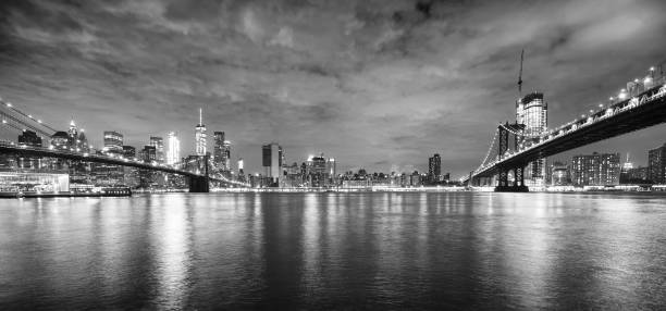 istock Brooklyn Bridge and Manhattan Bridge at night, New York. 802648840
